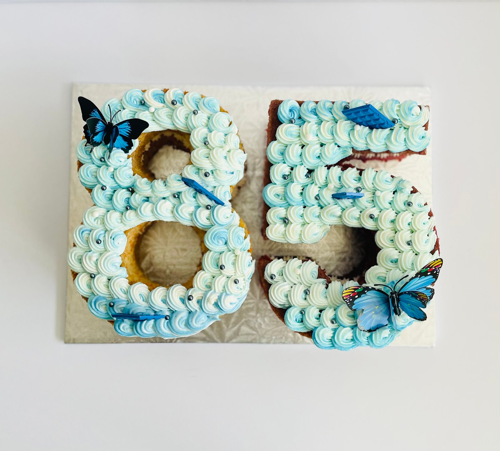 Number birthday cake with butterfly decorations